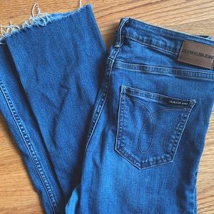 CK High Rise Raw Hem Jeans
